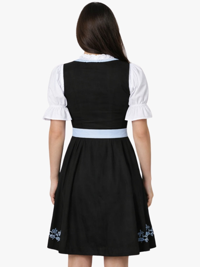 Front view of women's black Bavarian dirndl dress with white blouse, light blue apron, lace-up bodice, and embroidered traditional design.