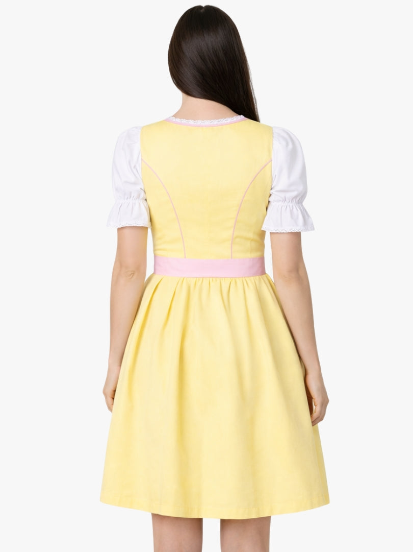 Back view of women's yellow Bavarian dirndl dress with white puff sleeve blouse and pink waist trim.