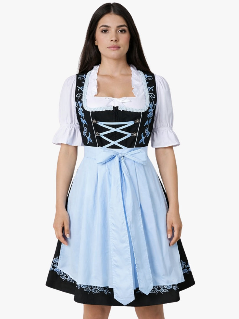 Front view of women's black Bavarian dirndl dress with white blouse, light blue apron, lace-up bodice, and embroidered traditional design.