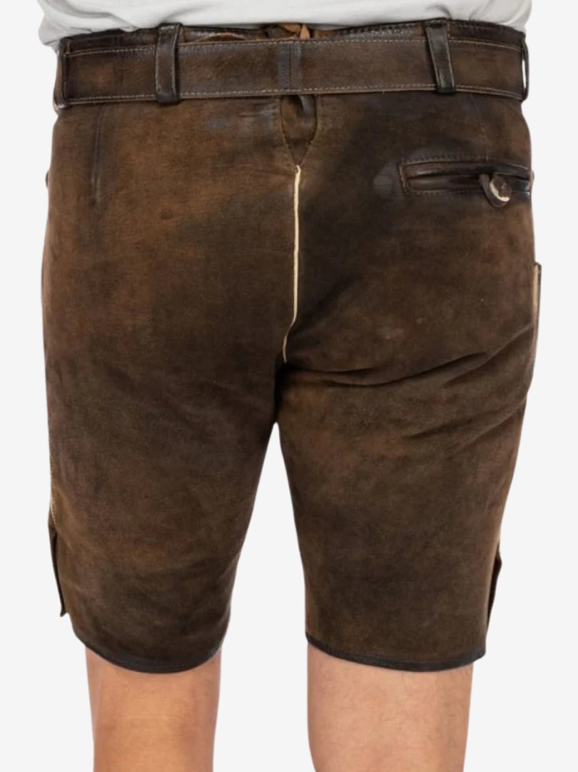 Rear view of brown lederhosen showing a smooth leather finish, back pocket with button closure, and belt loops.