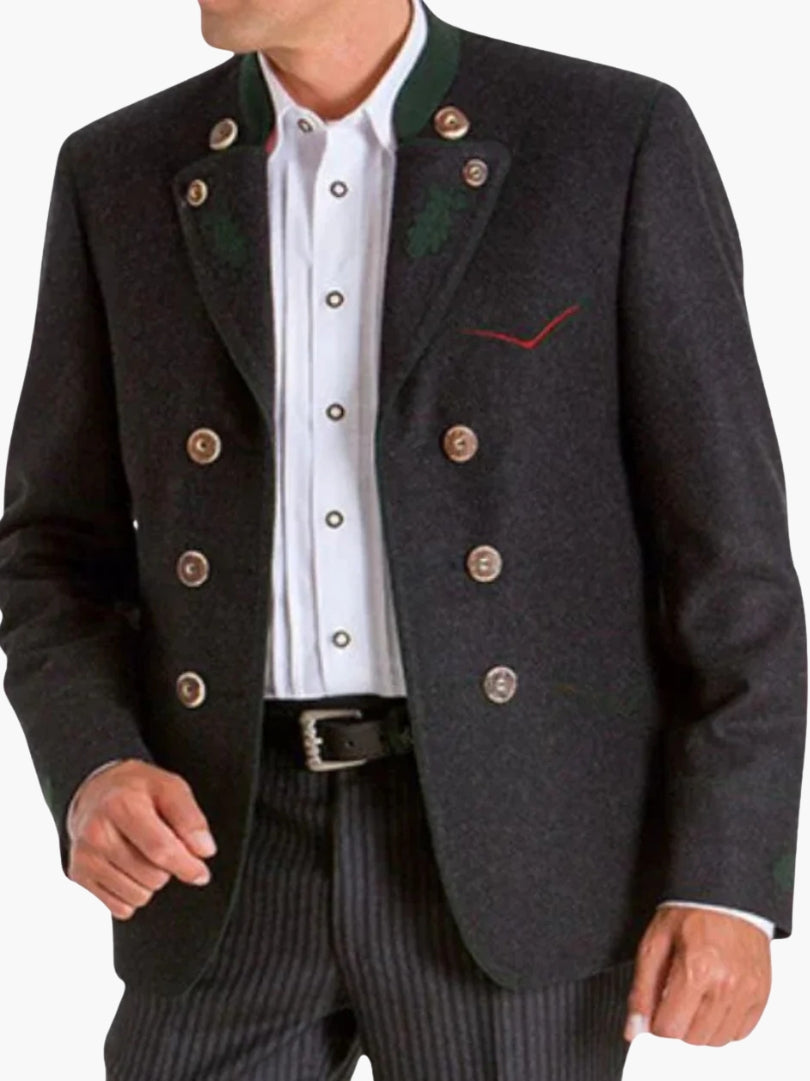 Close-up of dark charcoal double-breasted Bavarian Trachten jacket with green collar, decorative buttons, and white shirt for a traditional Oktoberfest look.