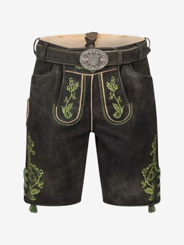 Black leather lederhosen shorts with green floral embroidery, front flap design, and decorative belt with metal buckle.