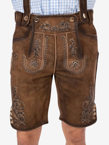 Brown leather lederhosen with detailed embroidery on the front flap and thighs, worn with suspenders and a light blue checkered shirt.