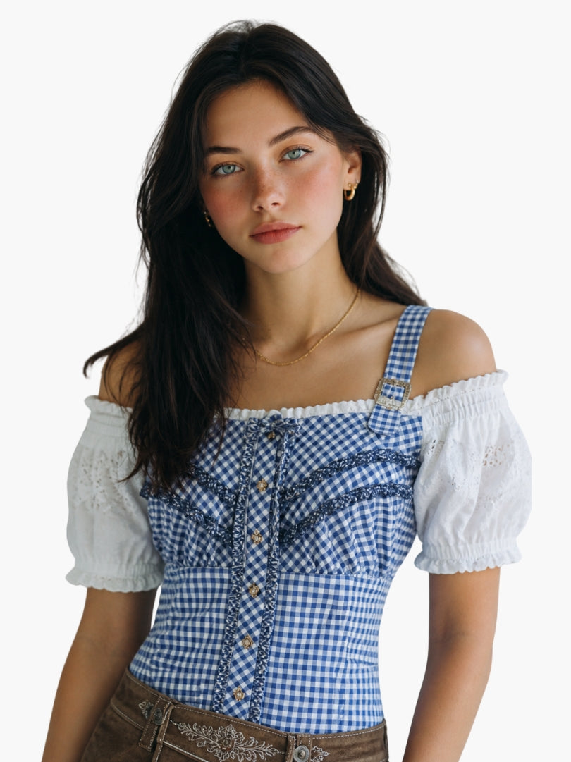 Women’s authentic Bavarian trachten blouse in blue gingham with off-shoulder white puff sleeves, styled for traditional Oktoberfest outfit.