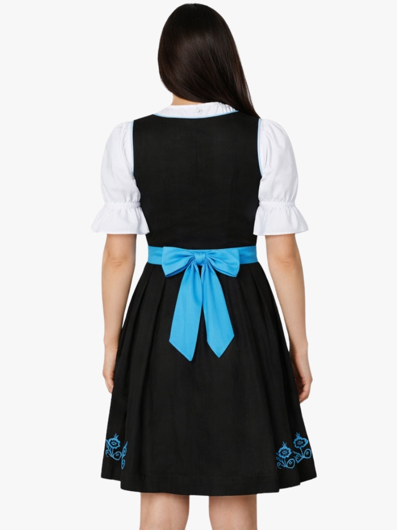 Back view of women's black Bavarian dirndl dress with white puff sleeve blouse and light blue apron tied in a bow.