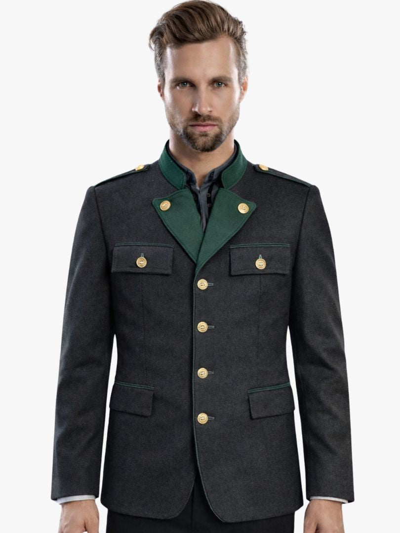 Man wearing charcoal wool Bavarian Trachten jacket with green trim and traditional buttons