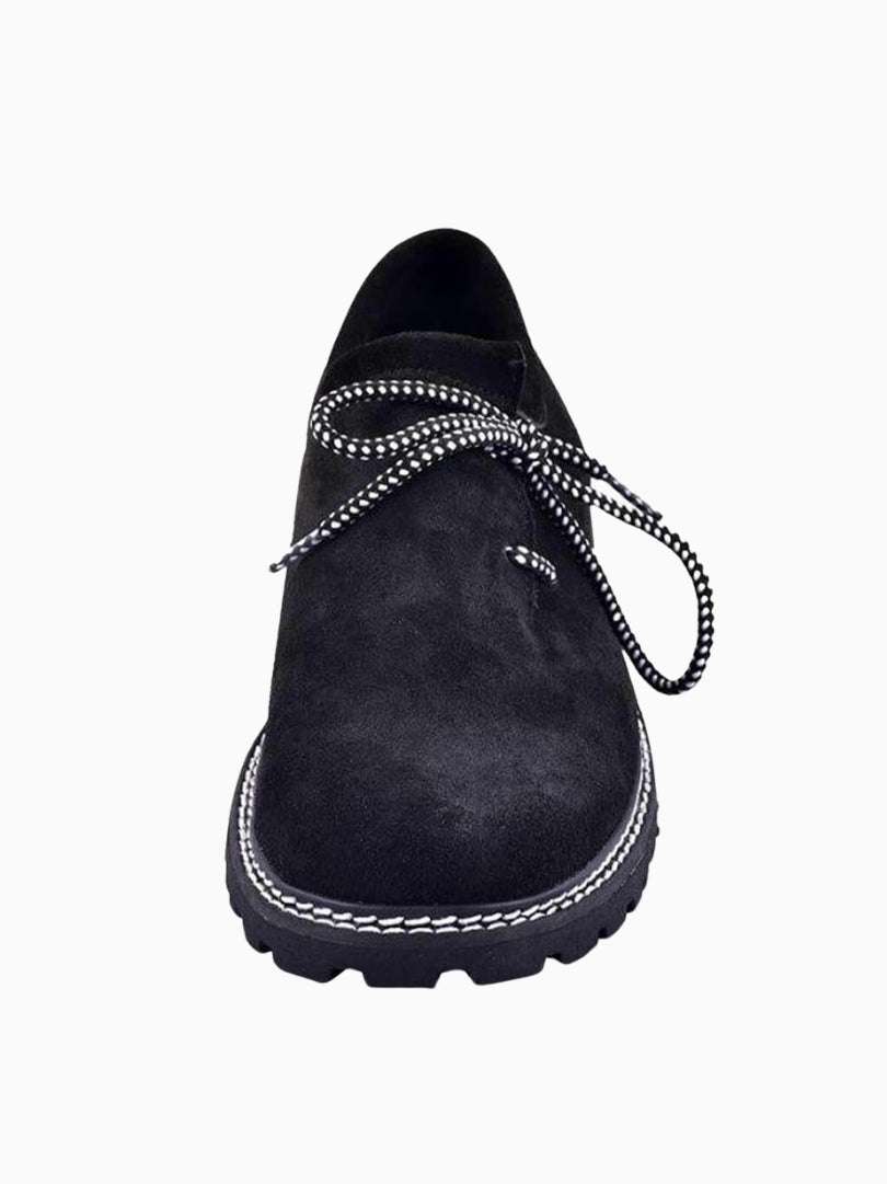 Black suede traditional Bavarian Haferl shoes with lace-up design and rugged sole, front view.