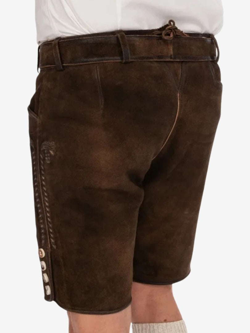 Rear view of dark brown leather lederhosen showing smooth finish, adjustable back tie, and side button details.