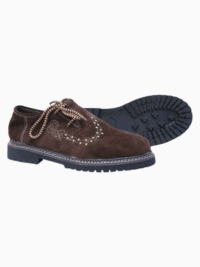 Side view of brown suede traditional Haferl shoes with decorative stitching, lace-up design, and rugged black sole, shown on white background