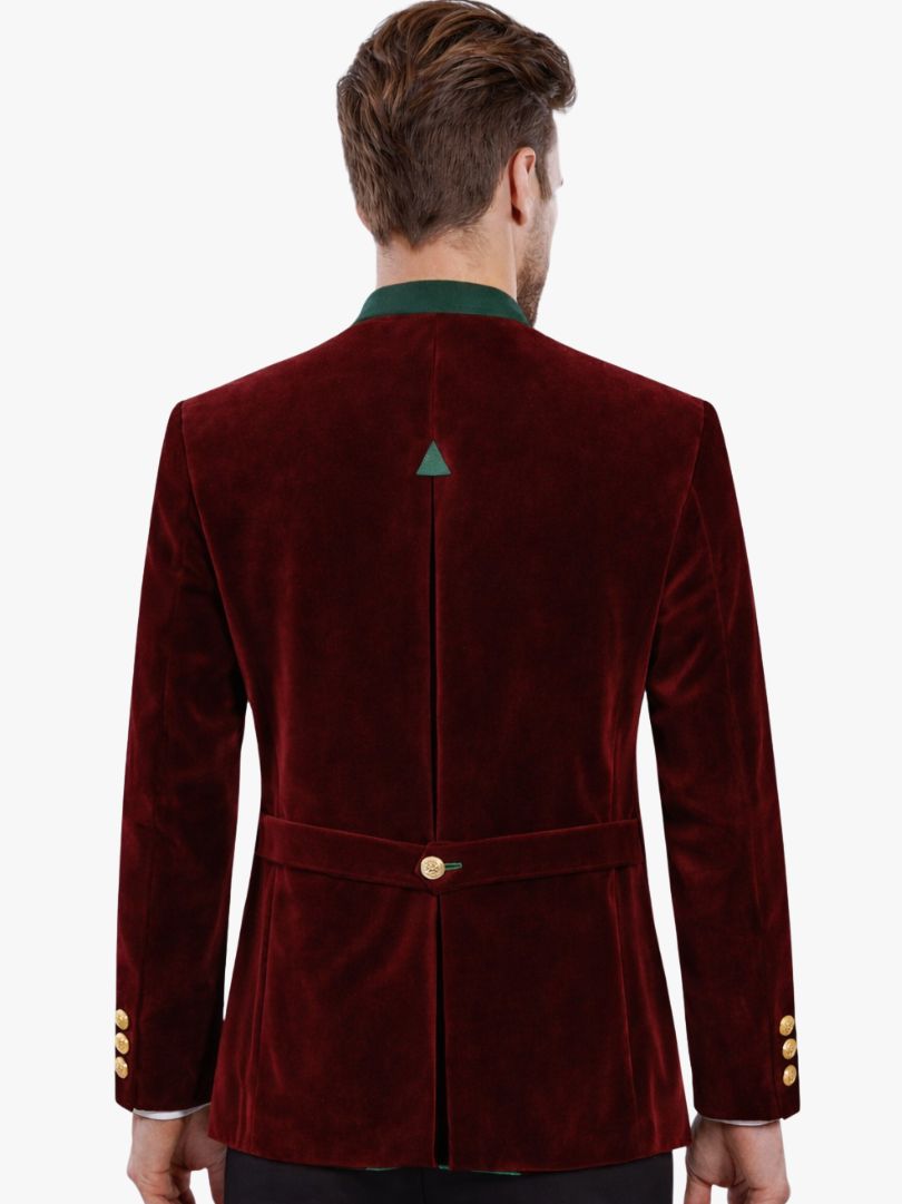 Back view of mens red velvet Bavarian Trachten jacket with green collar and waist strap