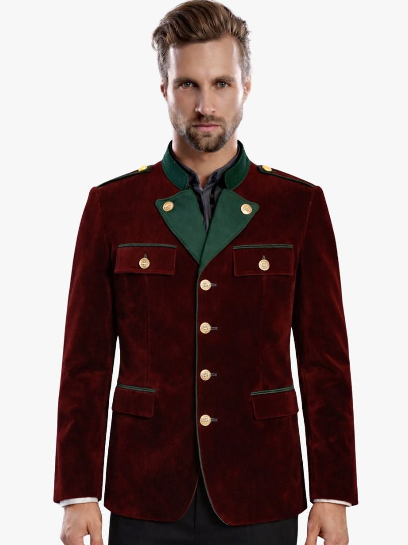 Man wearing red velvet Bavarian Trachten jacket with green trim