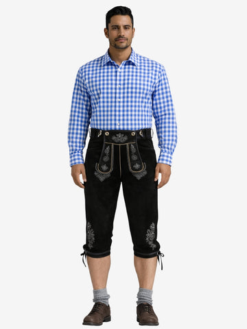 Man wearing black leather bundhosen with a blue checkered shirt, socks, and shoes in a full-length front view.