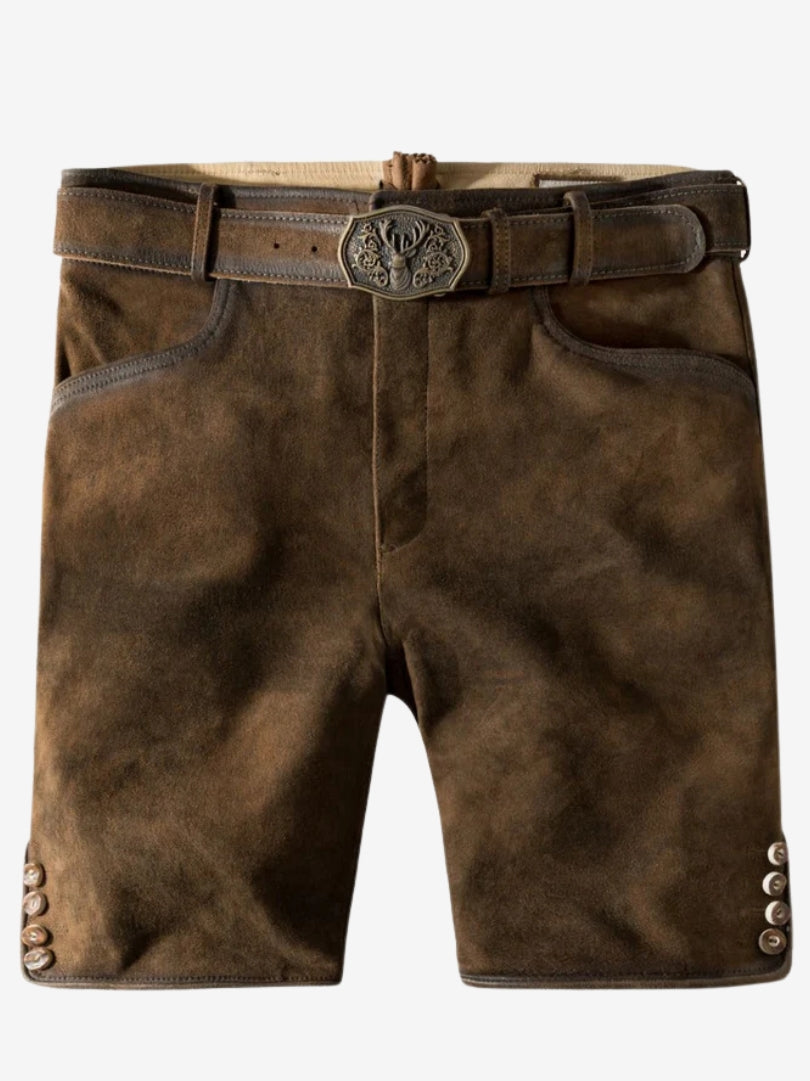 Man wearing plain brown suede lederhosen shorts with a white button-up shirt and a traditional belt featuring a deer motif buckle.