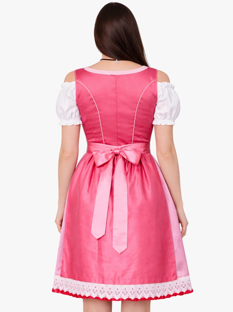 Back view of women's pink traditional dirndl dress with fitted bodice and bow-tied satin apron in Oktoberfest style.