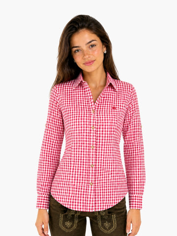 Women’s premium Bavarian style shirt in red check pattern with button front and tailored fit, paired with traditional lederhosen.