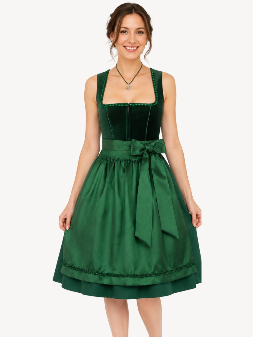 Premium green Oktoberfest dirndl dress with velvet bodice, decorative trim, satin waist bow, and pleated skirt.