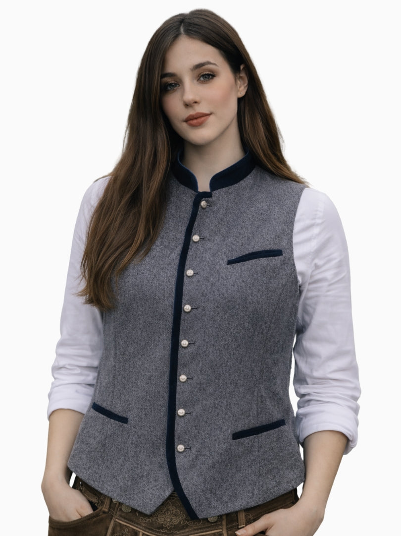 Front view of women's grey Bavarian Trachten vest with navy trim, decorative buttons, and traditional Oktoberfest style.