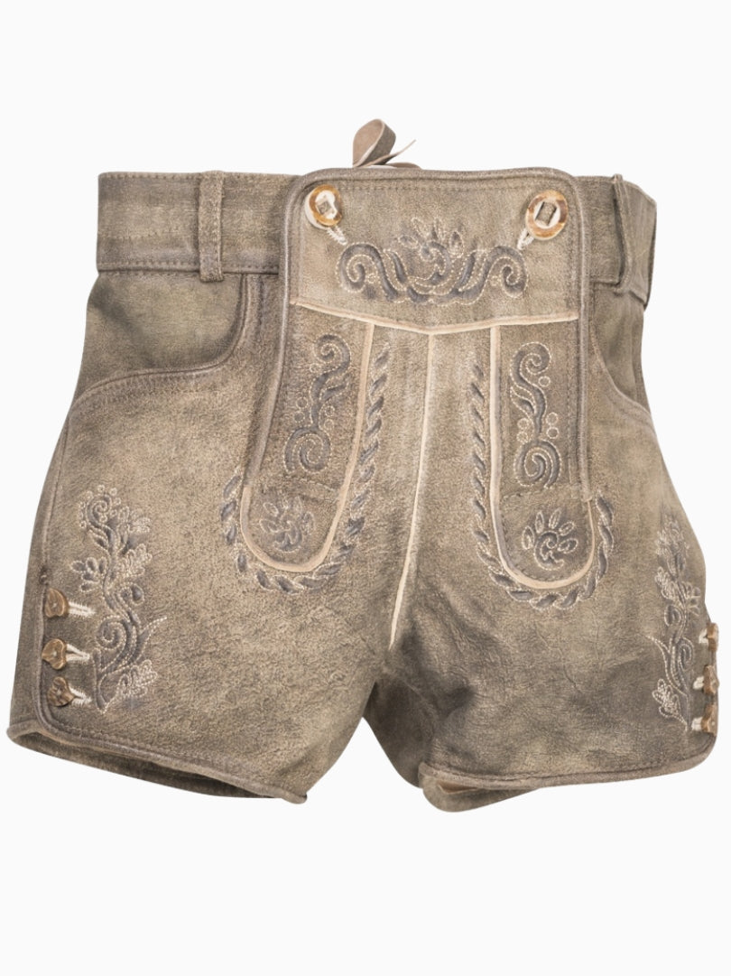 Traditional Bavarian lederhosen with embroidery on a white background