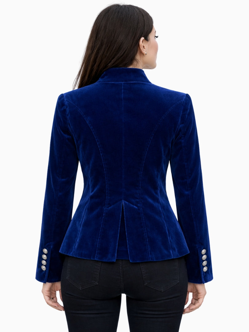 Back view of women's royal blue velvet Bavarian Trachten jacket with tailored waist, structured seams, and decorative cuff buttons.