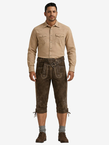 Man wearing brown leather bundhosen with a beige shirt, grey socks, and brown shoes, shown in a full front view.