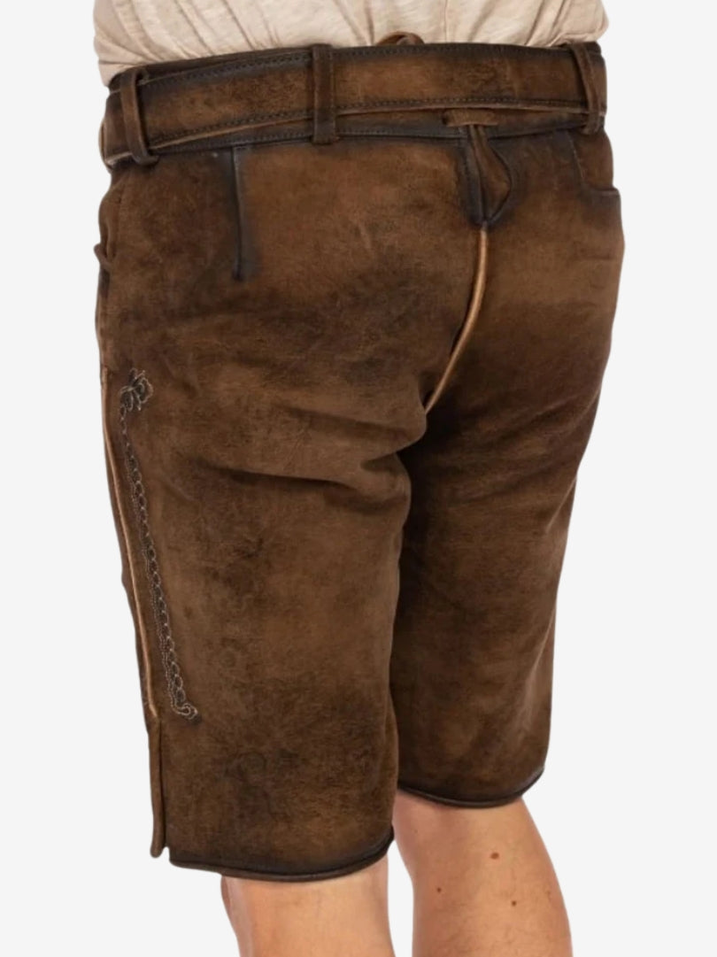 Rear view of brown lederhosen showing smooth leather finish, back seam, and traditional adjustable tie.