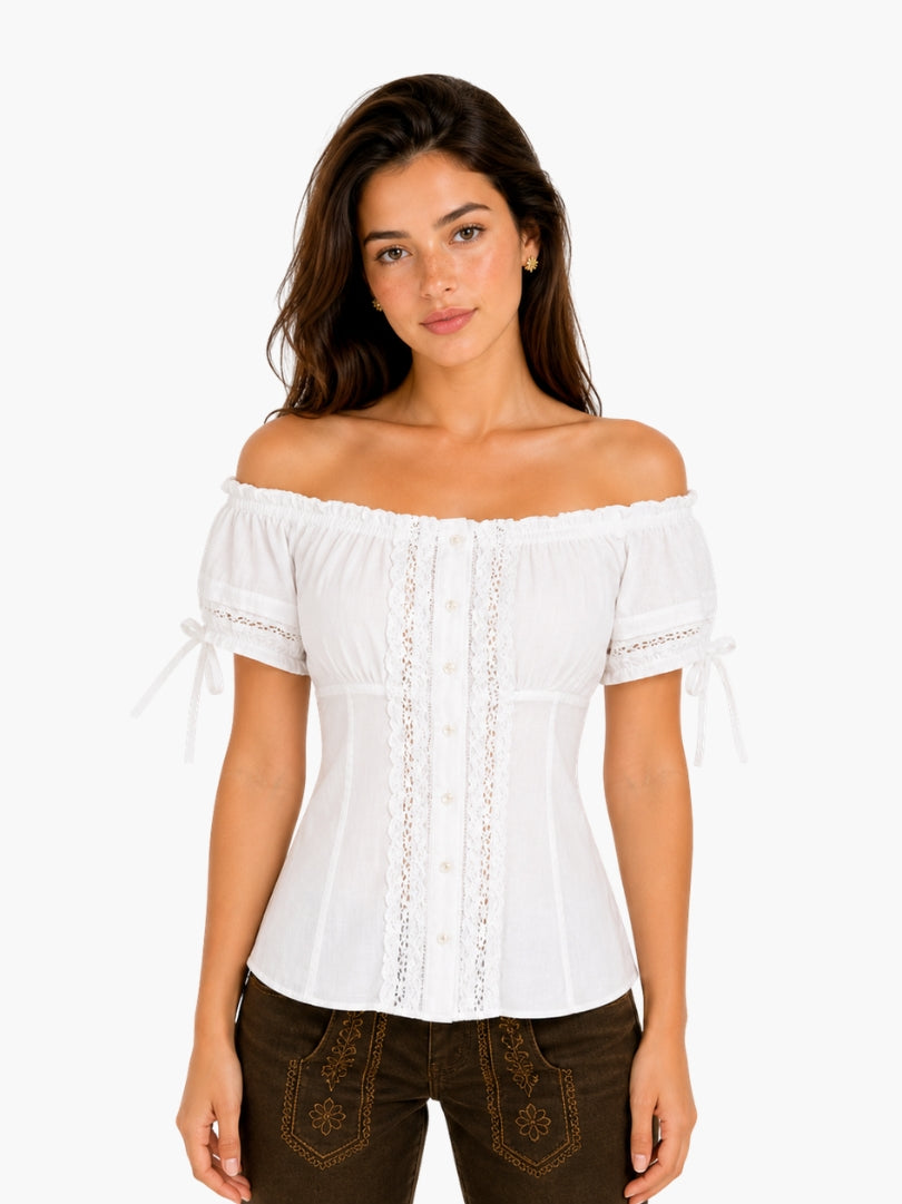 Women’s white Oktoberfest blouse with off-shoulder neckline, lace panel detailing, and fitted silhouette paired with lederhosen.