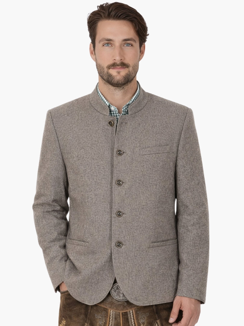 Man wearing grey Bavarian jacket with lederhosen, featuring traditional button front, tailored fit, and Oktoberfest style outfit.

