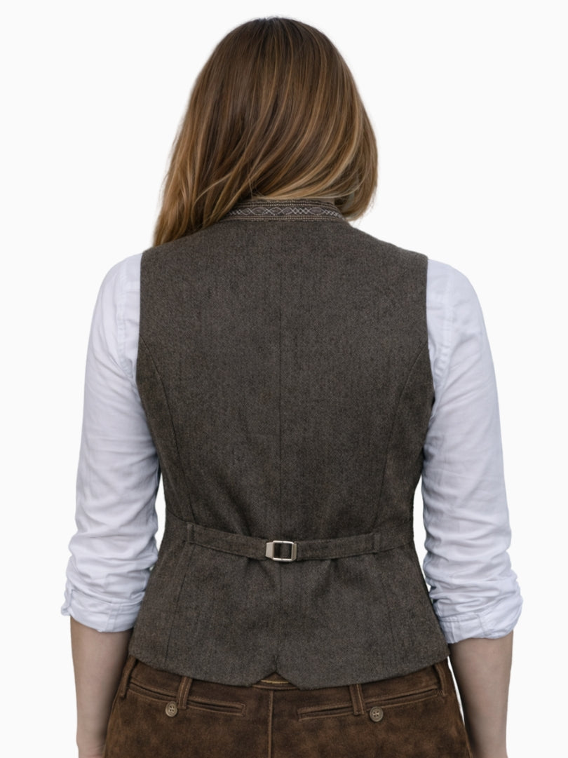 Back view of women's brown wool Bavarian Trachten vest with adjustable waist belt and tailored Oktoberfest style fit.