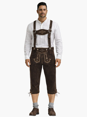 Man wearing brown leather bundhosen with suspenders, paired with a white shirt, grey socks, and brown shoes in a front-facing pose.