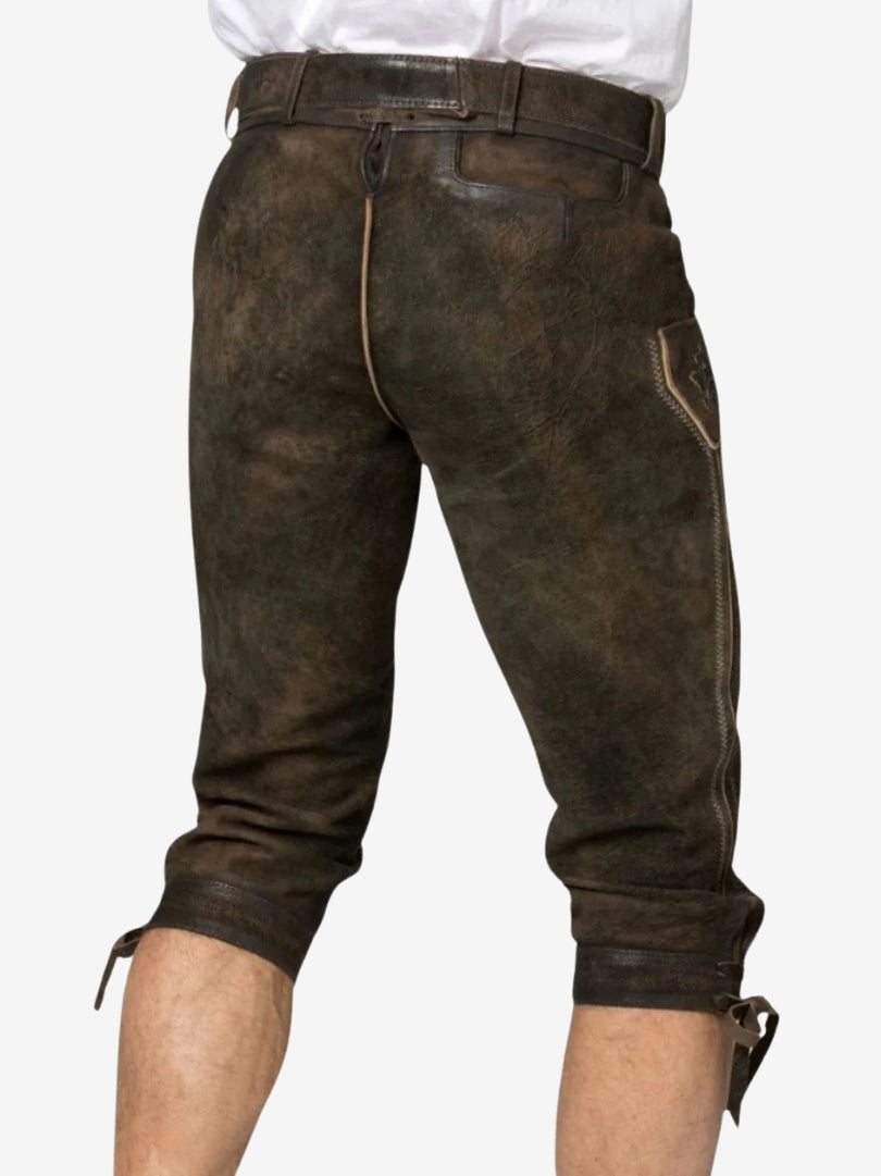 Back view of brown bundhosen highlighting rear seam, adjustable waistband, and knee-length cut with tie closures.