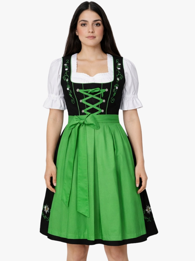 Front view of women's black Bavarian dirndl dress with white blouse, green lace-up bodice detailing, and bright green apron.