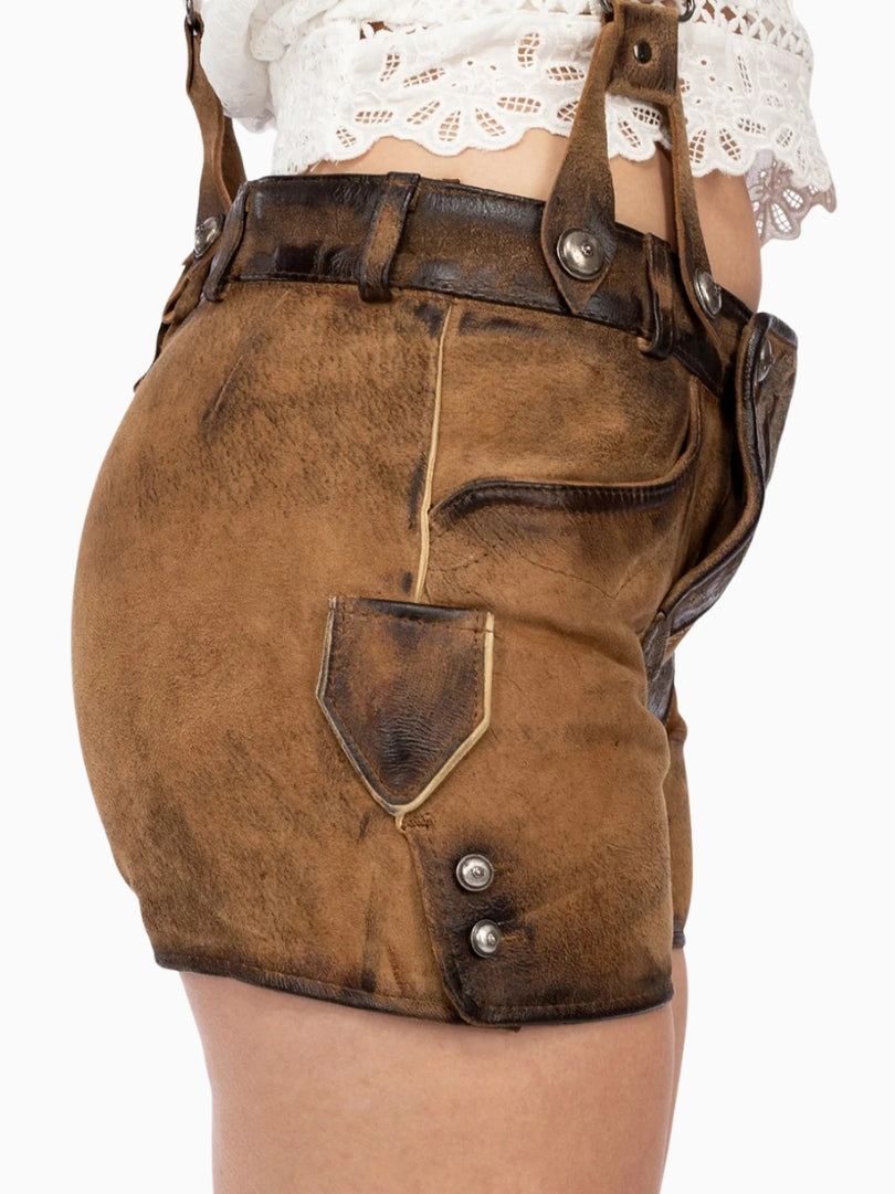 Brown leather skirt with suspenders on a white background