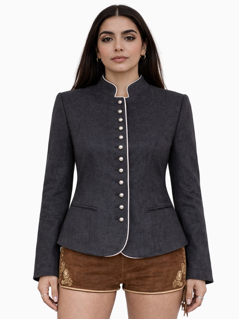 Woman wearing a dark gray blazer with white buttons on a white background
