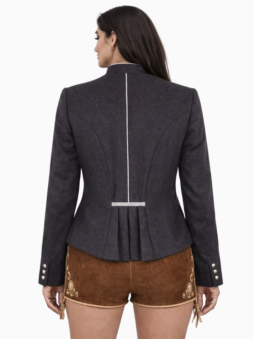 Woman wearing a dark gray blazer with a pleated back design on a white background